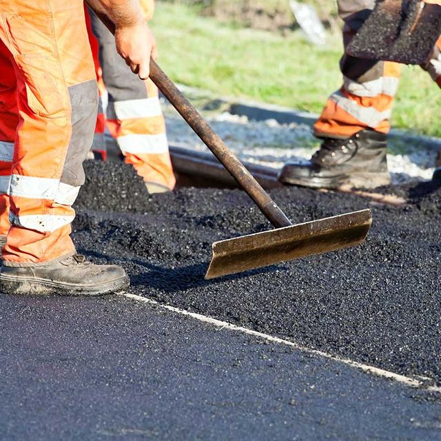 construction-workers-working-next-to-railway